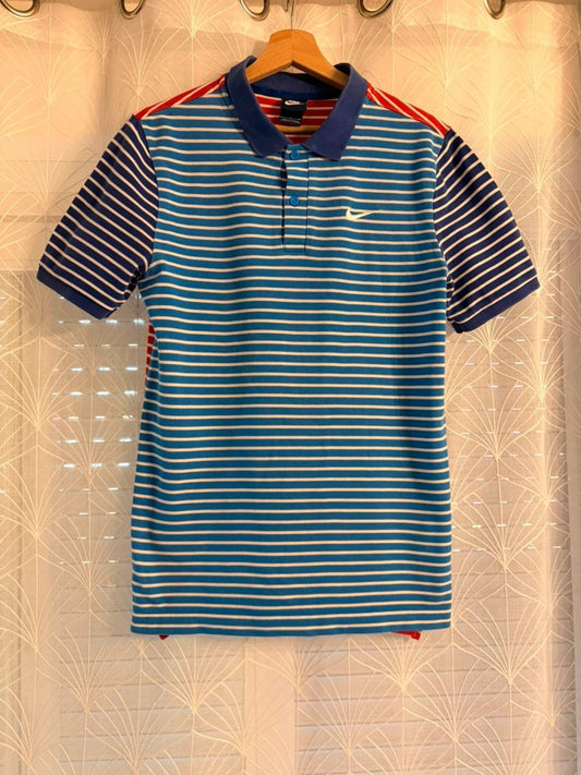 🌈👕 Polo Nike a rayas multicolores - Alegre y deportivo