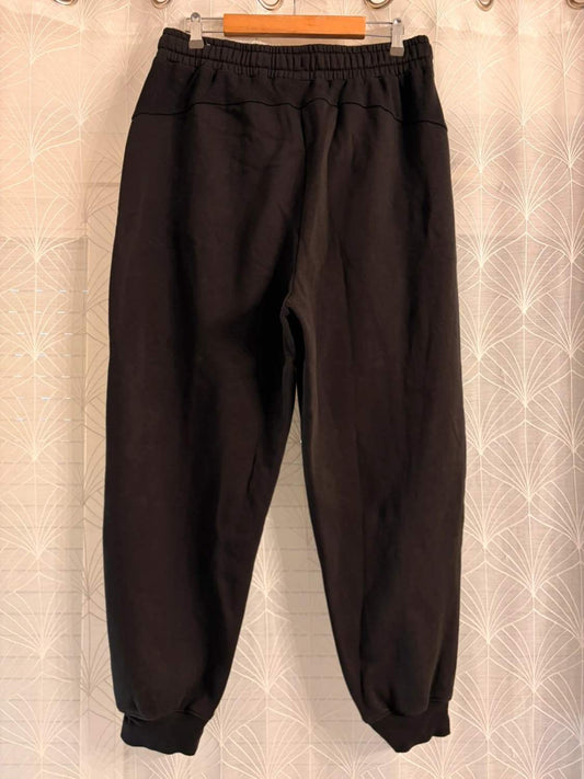 Pantalon de survêtement noir à taille élastique, style casual pour homme ou femme