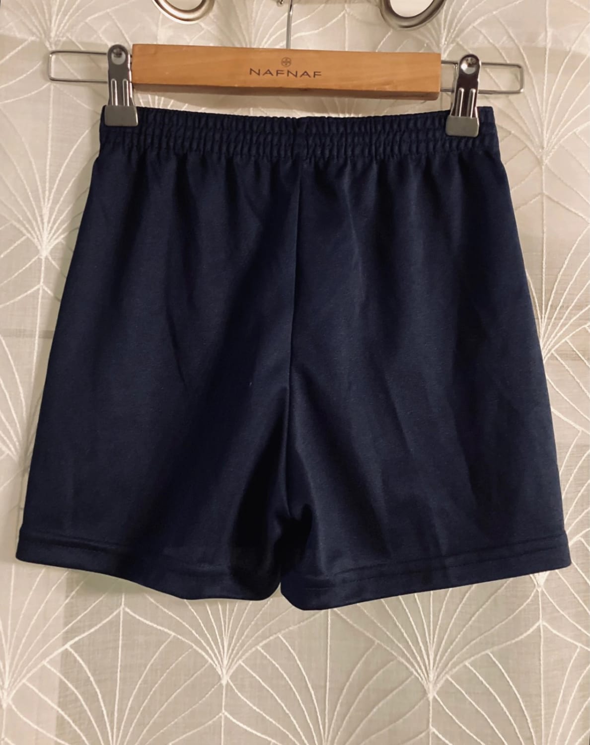 Short Errea 6A en très bon état garçon marine