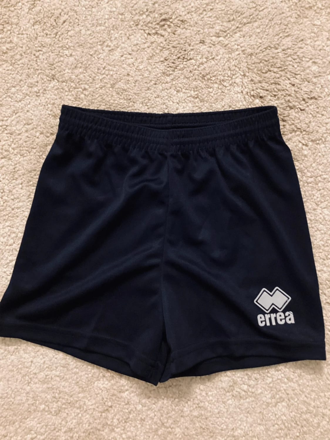 Short Errea 6A en très bon état garçon marine