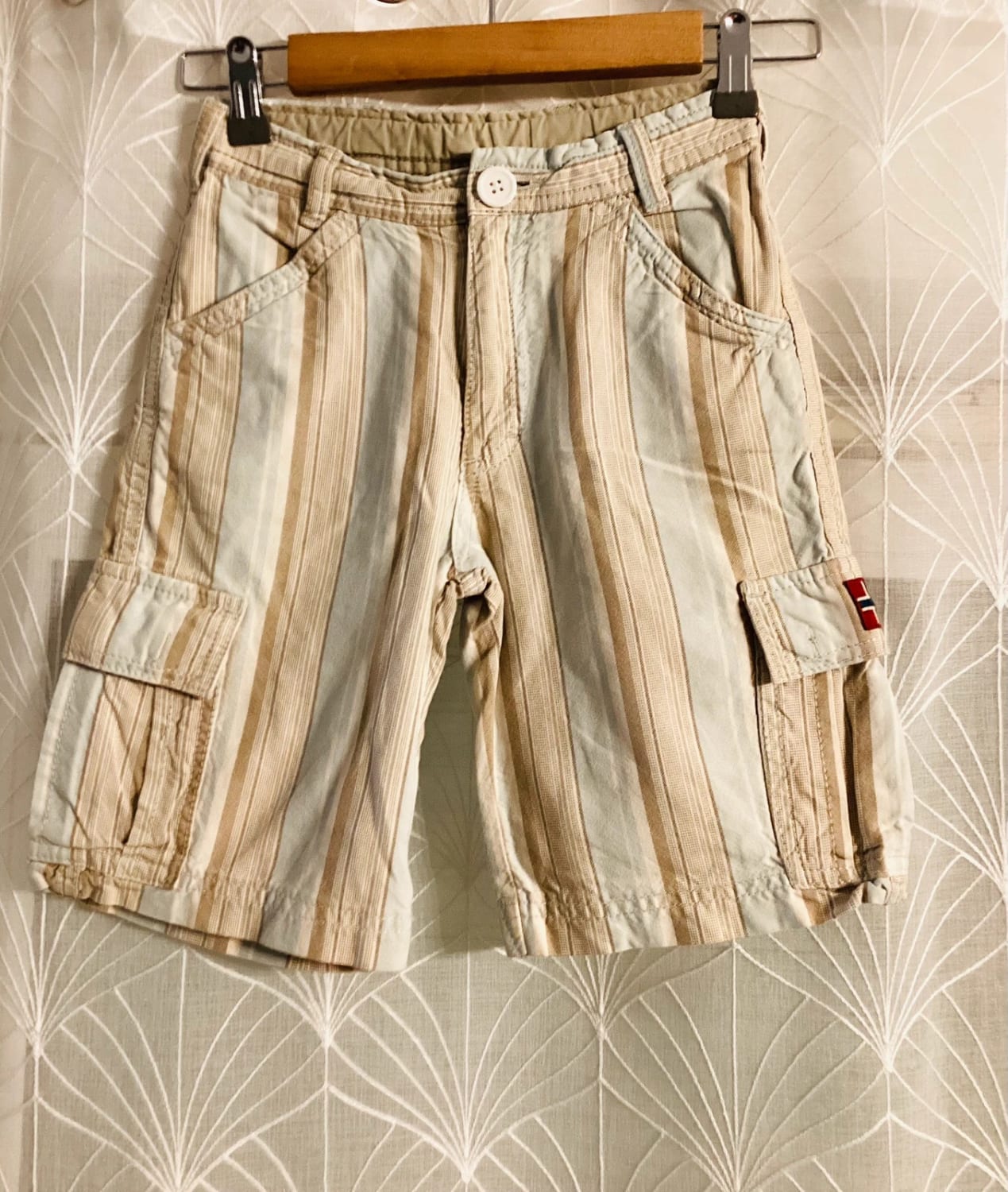 Short Napapijri 8A en très bon état pour garçon bleu marron