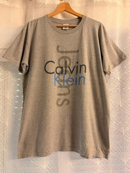 T-shirt Vintage Calvin Klein Jeans Logo Gris Chiné Made in USA 90s – Mixte – Taille M