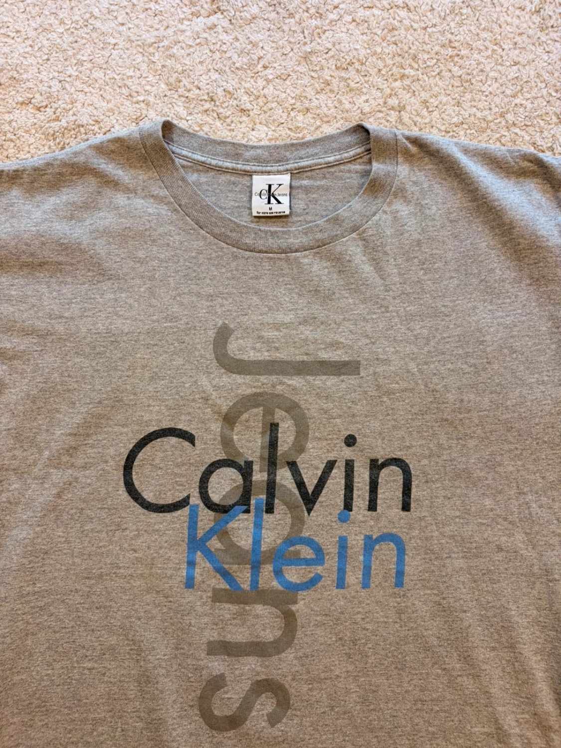 T-shirt Vintage Calvin Klein Jeans Logo Gris Chiné Made in USA 90s – Mixte – Taille M