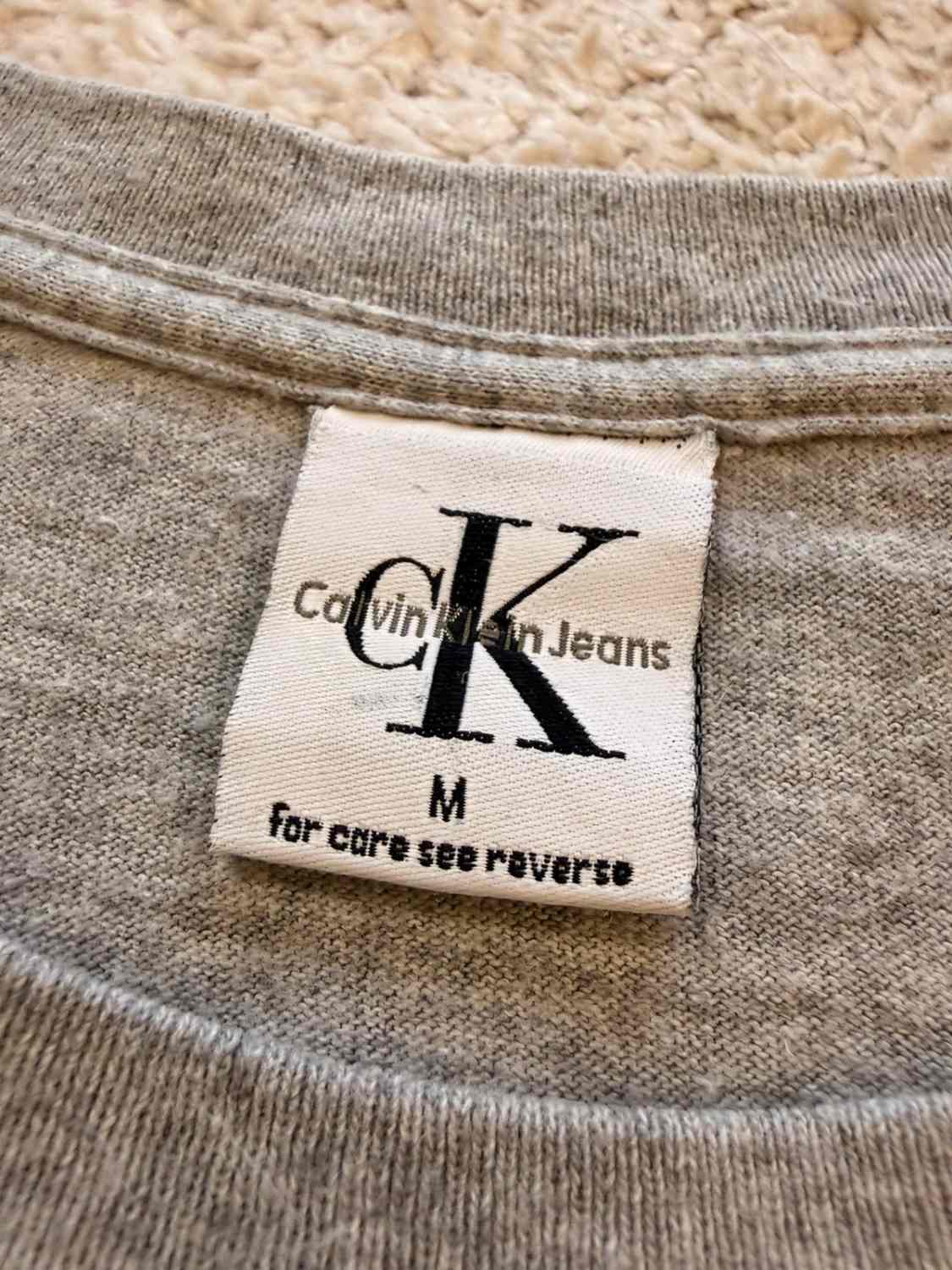 T-shirt Vintage Calvin Klein Jeans Logo Gris Chiné Made in USA 90s – Mixte – Taille M
