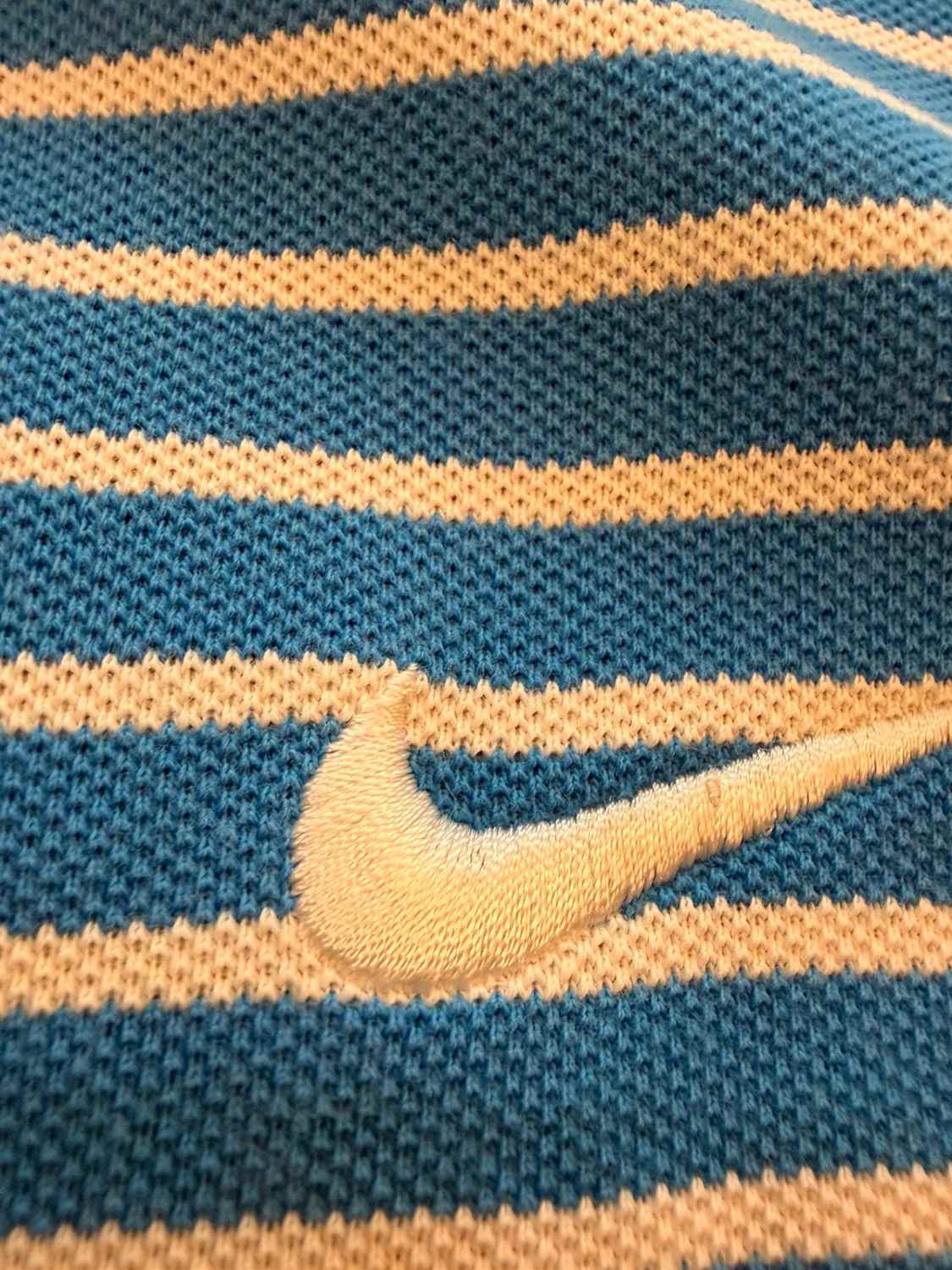 🌈👕 Polo Nike à Rayures Multicolores - Joyeux & Sportif