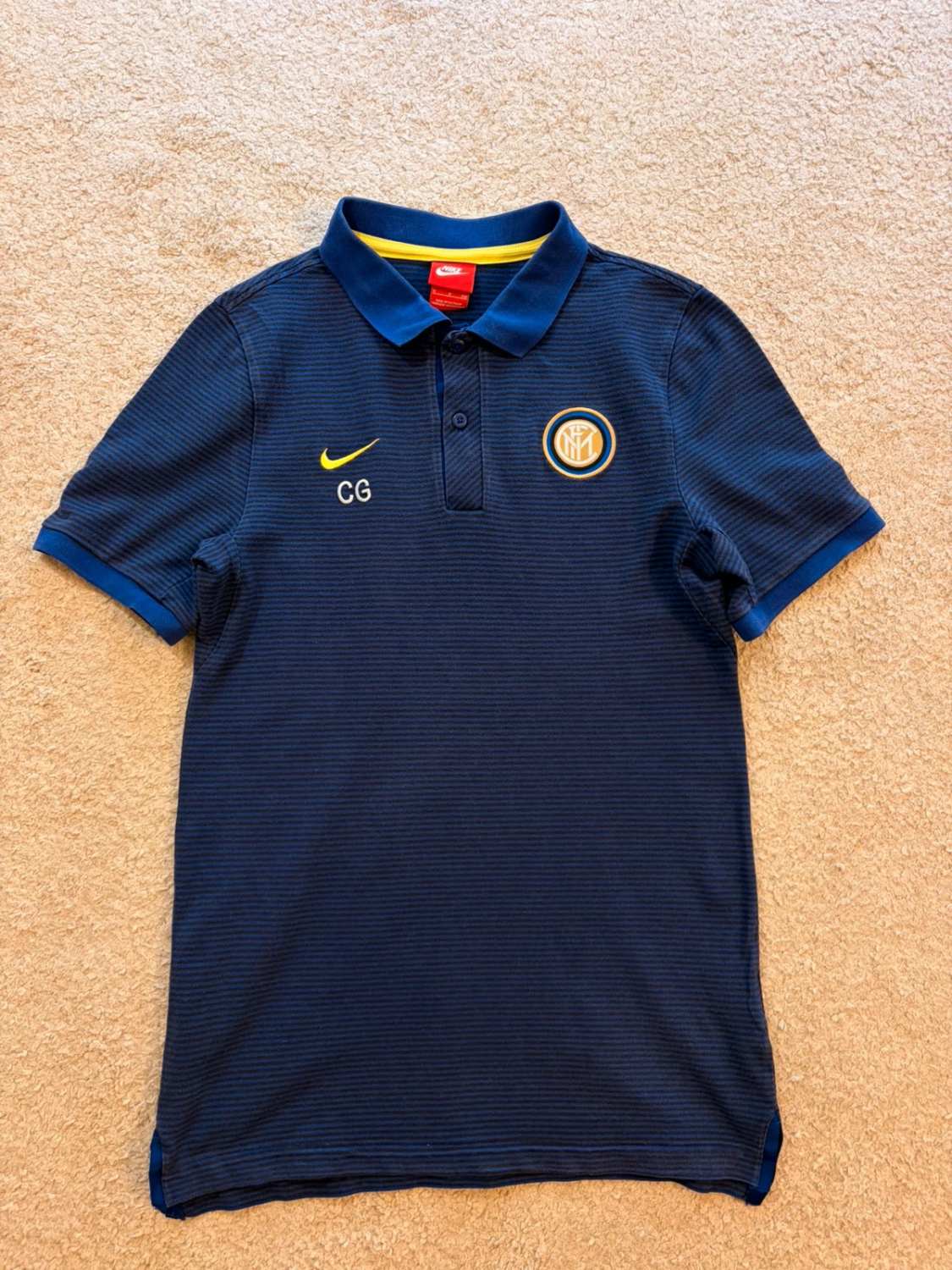 🎾🔵 Polo Nike "CG" à Rayures Bleu/Noir - Sportif & Féminin