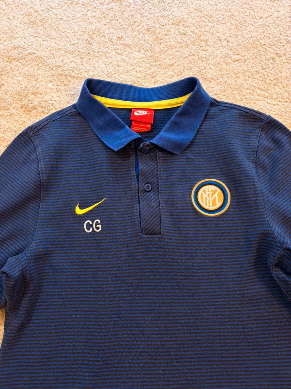 🎾🔵 Polo Nike "CG" à Rayures Bleu/Noir - Sportif & Féminin