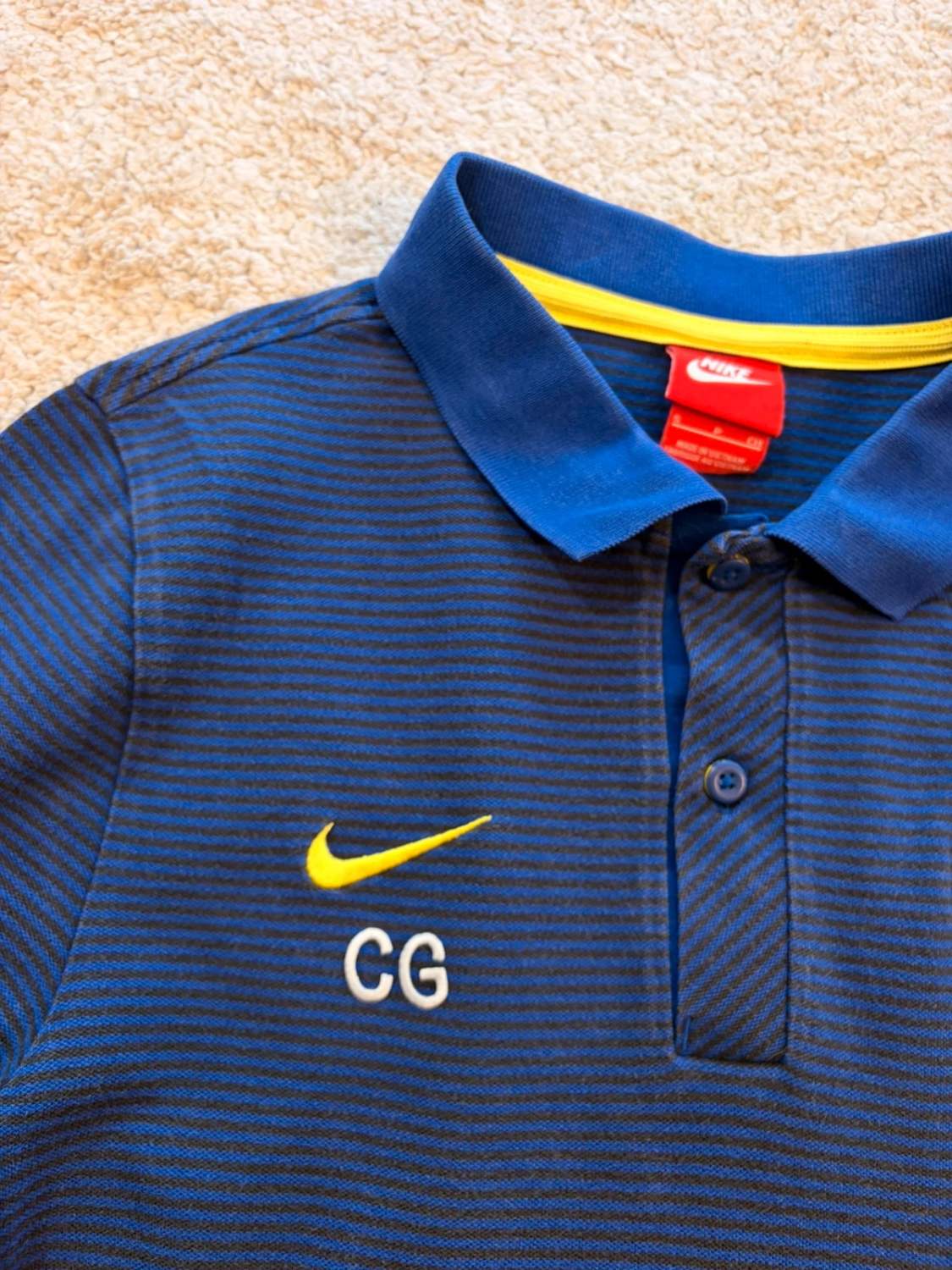 🎾🔵 Polo Nike "CG" à Rayures Bleu/Noir - Sportif & Féminin