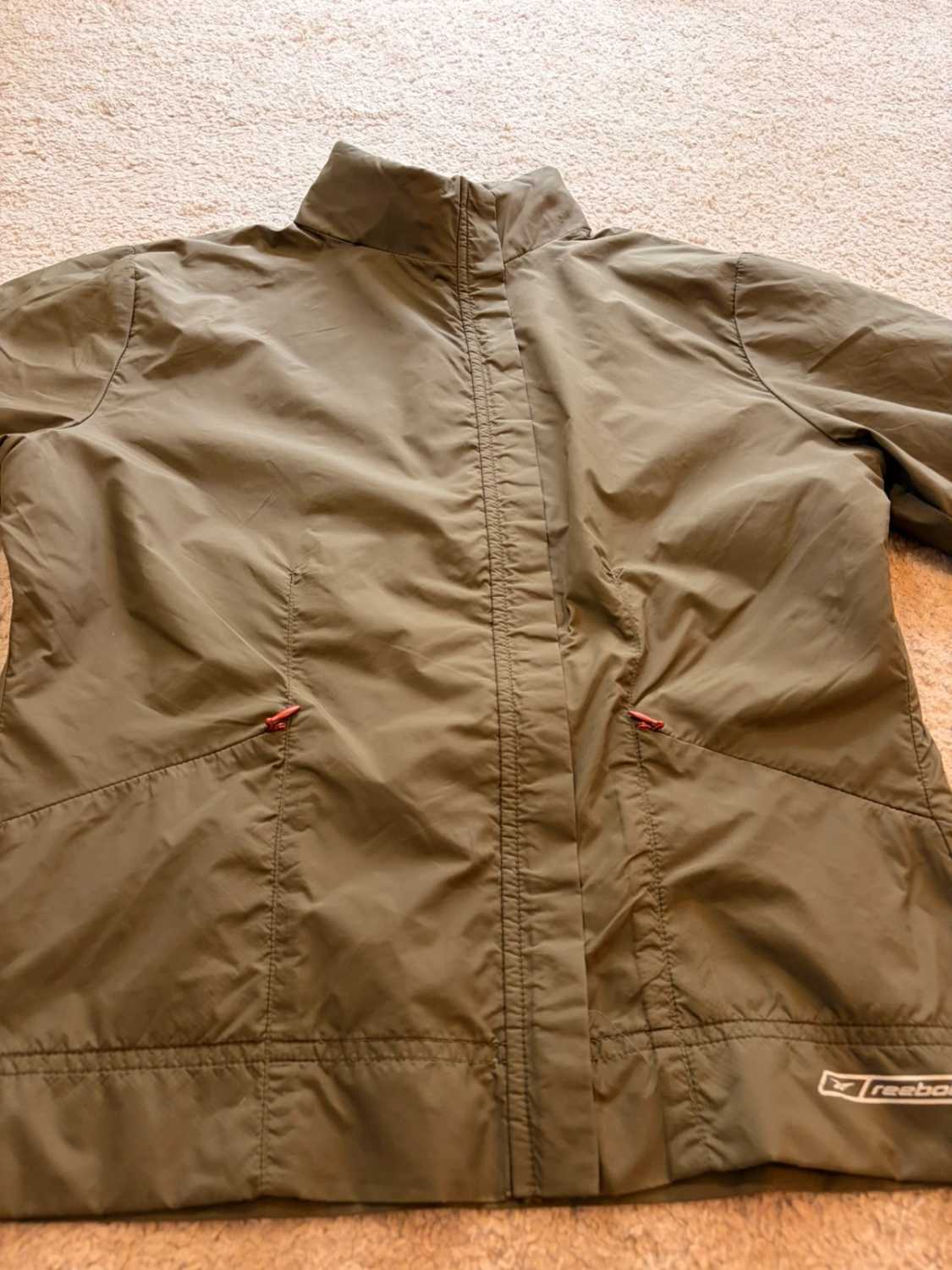 🤎 Veste Reebok Imperméable à Capuche Kaki - Protection & Style