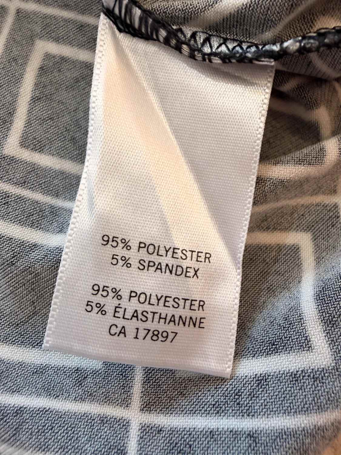 🤍 Blouse Banana Republic Sans Manches Noir/Blanc - Contraste & Élégance